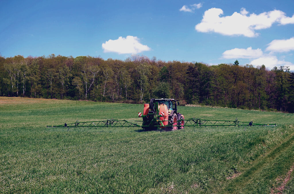 Aplicar coadyuvante con tractor